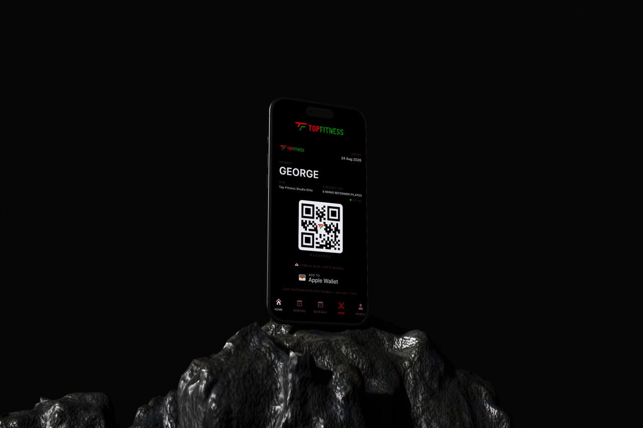 Top Fitness iOS membership app — a digital gym pass with QR code and Apple Wallet, built by Prime Tech